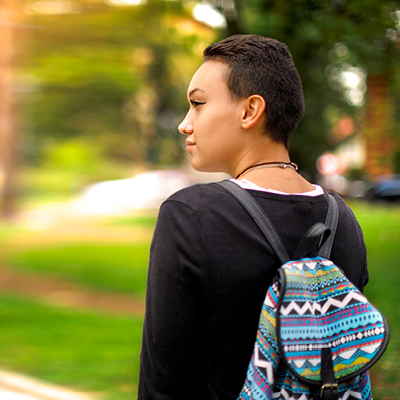 Student with colorful backpack