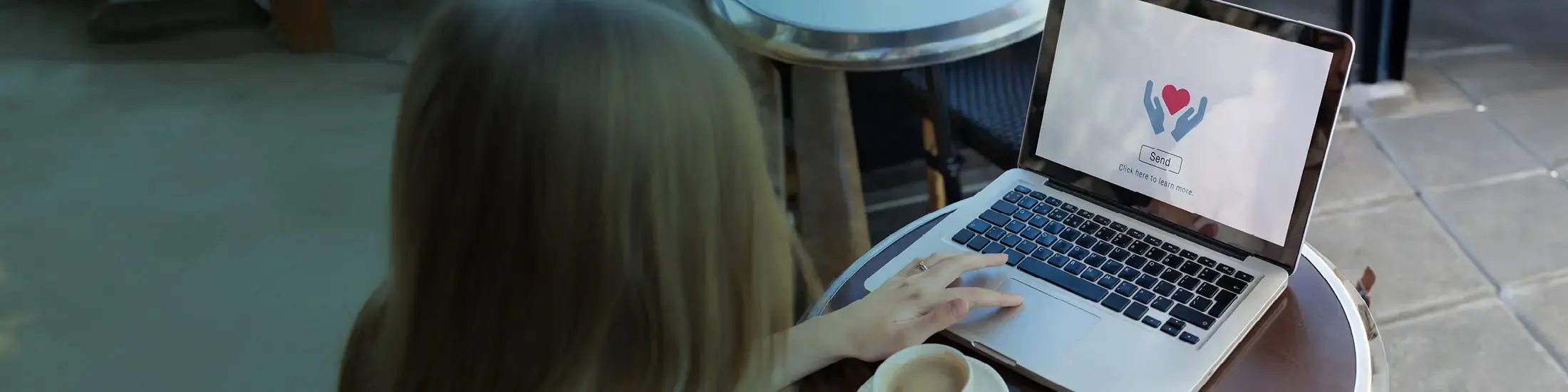 Donate image on the screen of a laptop. 
