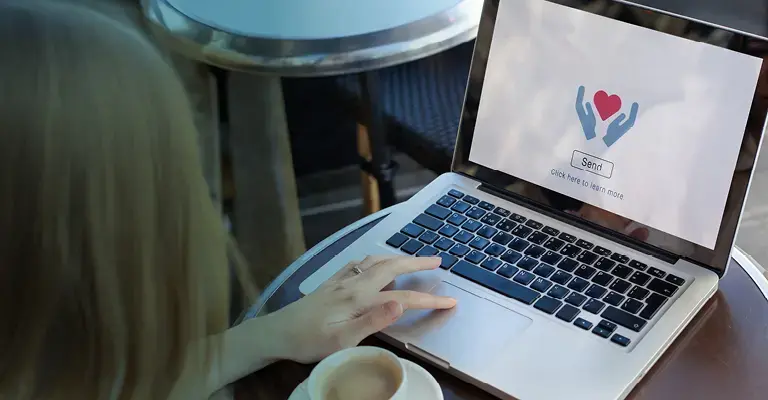 Donate image on the screen of a laptop. 
