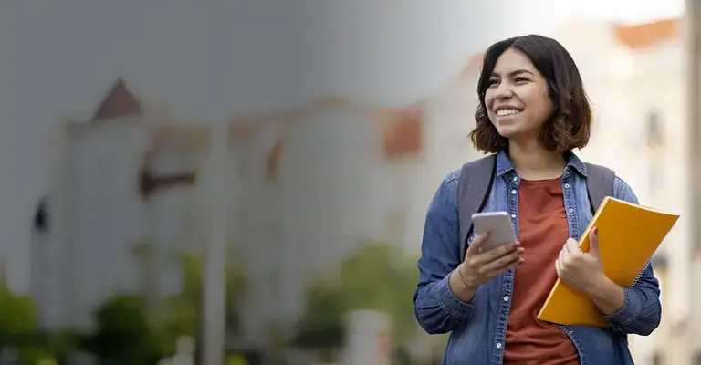 Happy Young Middle Eastern Woman Walking in the City After College Classes. 