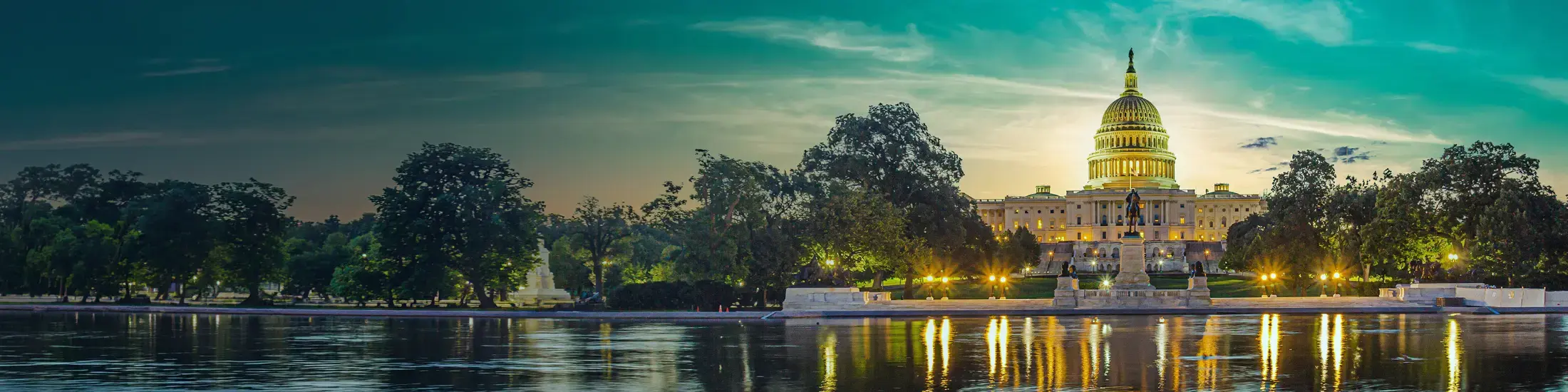 Image of the Capitol Building with reflection on water. 