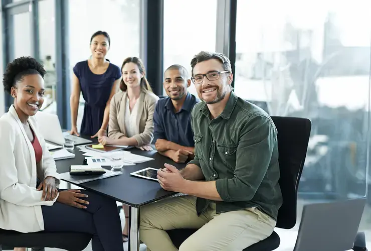 Portrait of a group of confident businesspeople having a meeting in the boardroom