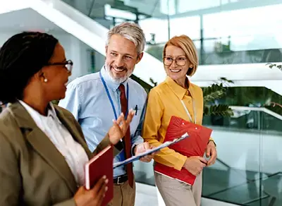 three colleagues in discussion