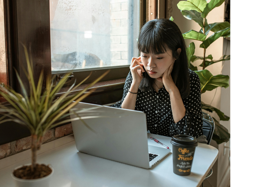 Student searching for student loans on her laptop